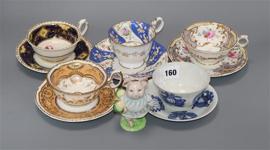Four cabinet cups and saucers, a Japanese cup and saucer and a Beatrix Potter Little Pig Robinson